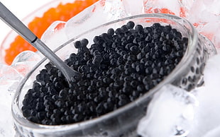 Caviar in clear glass bowl